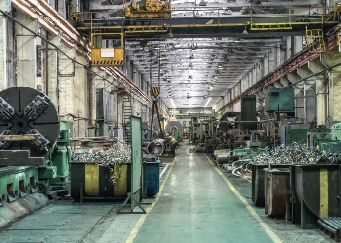 Workshop factory interior with machines, industrial lathes and steel manufacturing processing metal production.