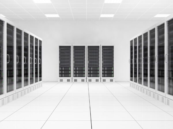 data center with two rows of computers in white room